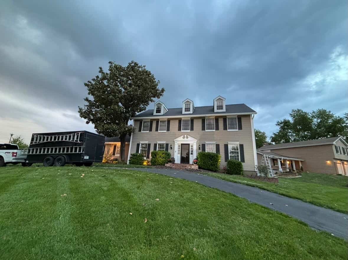 Full gutter system on colonial home — Phoenix Exteriors