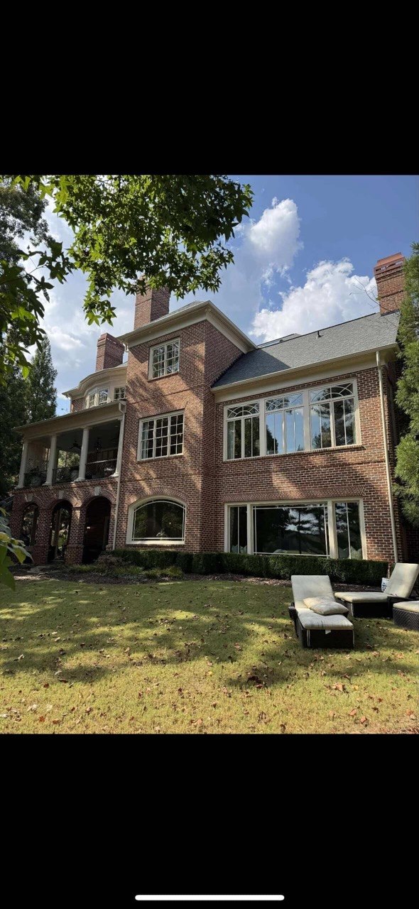 Luxury brick estate gutter work — Phoenix Exteriors